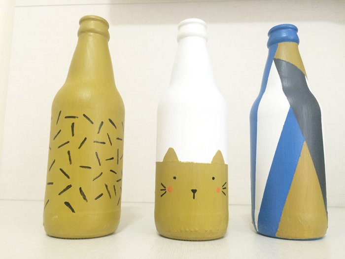 garrafa de vidro com gatinho