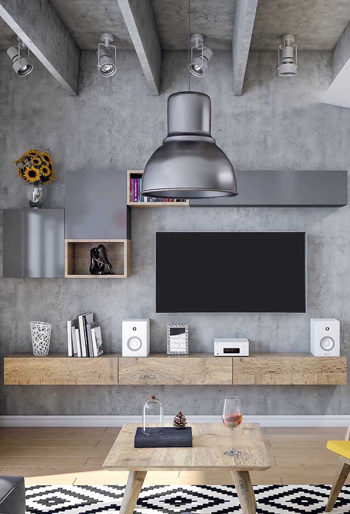 Você pode decorar a sala de TV seguindo o estilo industrial.