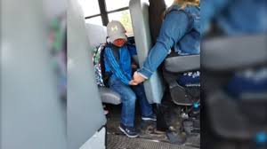 Bus driver holds nervous boy's hand on first day of school - ABC7 Chicago