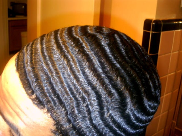 foto de homem negro com corte de cabelo Deep Waves