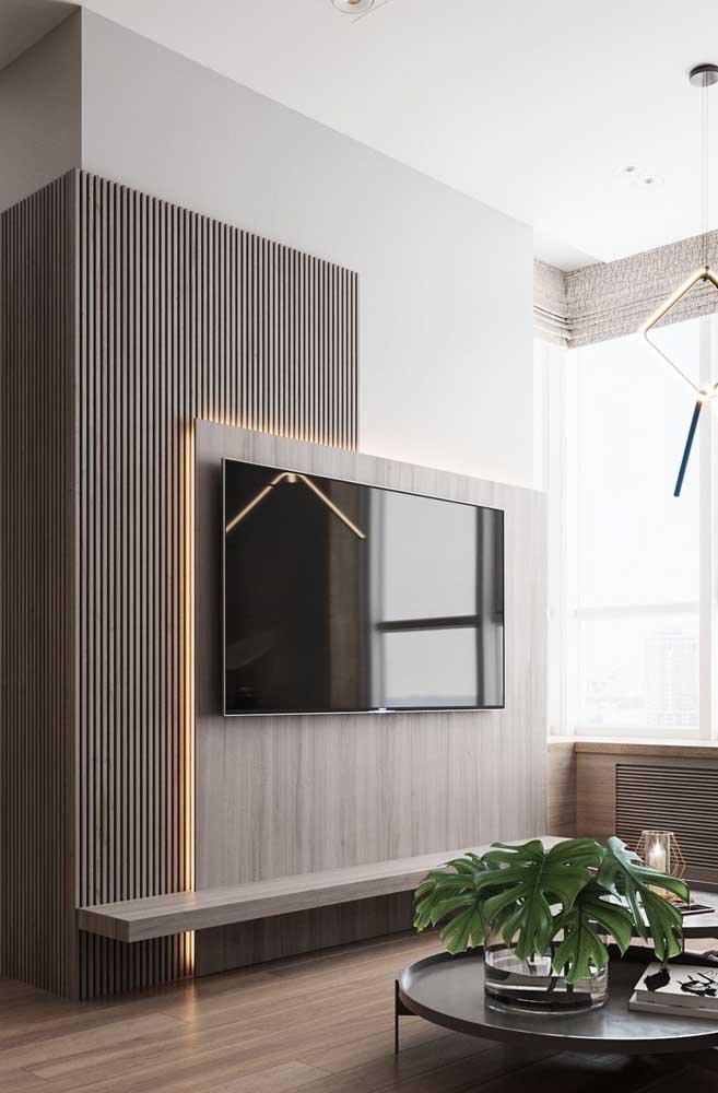 Papel de parede pode ser uma ótima opção de decoração para sala de TV.