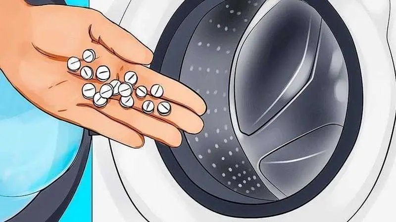 Coloque uma aspirina na máquina de lavar